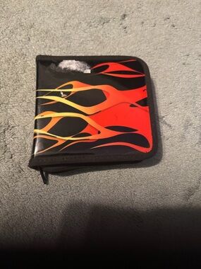 Two CD/DVD Wallets , Zip Closure and about 20 protection cases